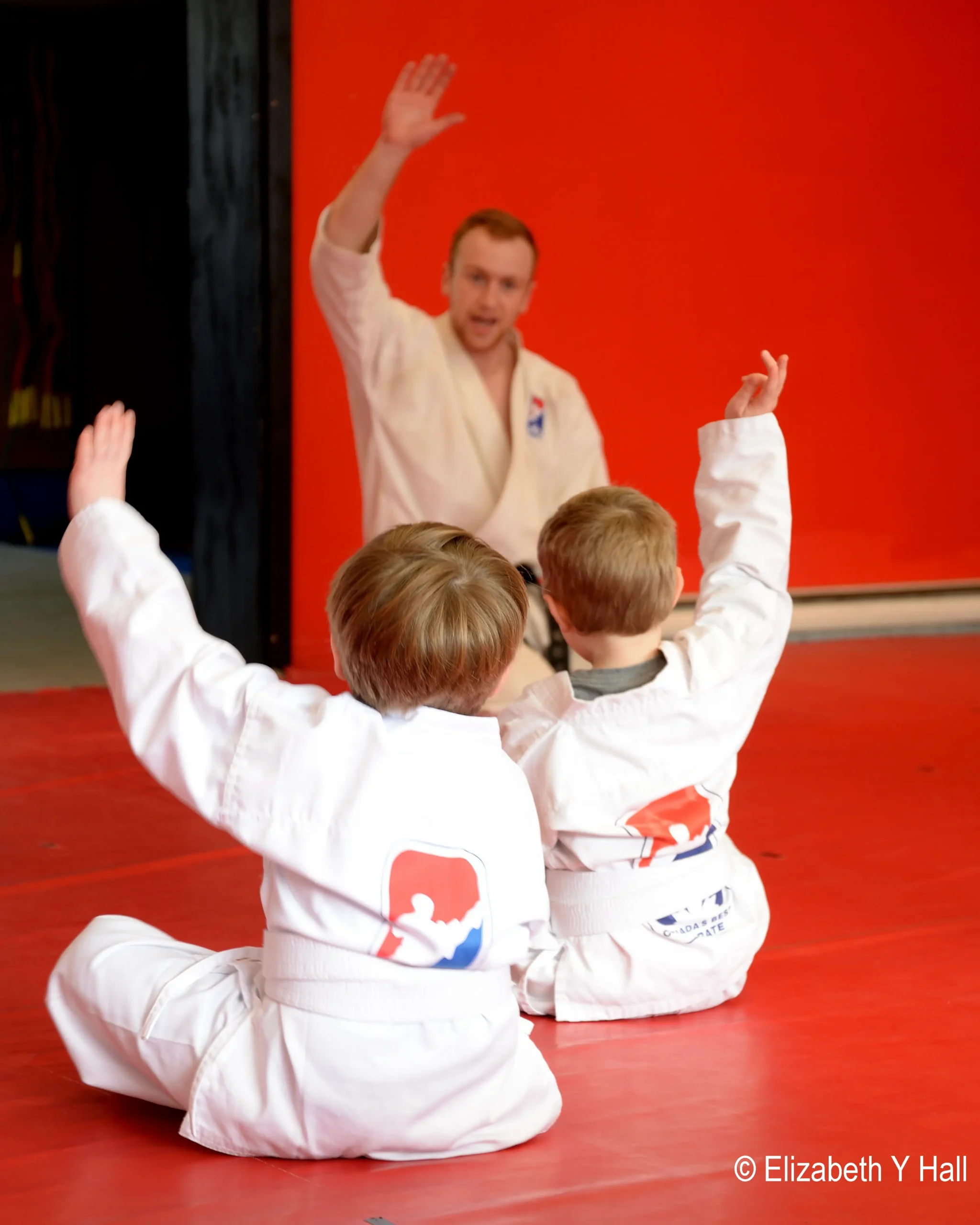 Young children in a tots karate class